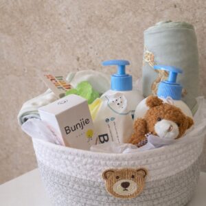 Baby gift box with pink teddy and pastel flowers